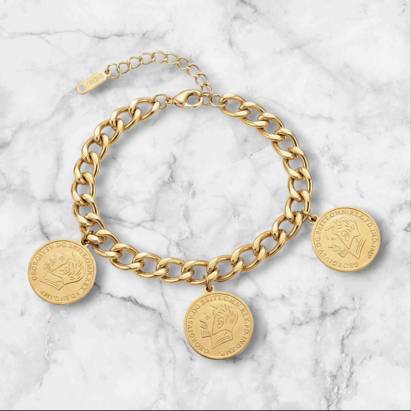 An elegant gold bracelet made of rust-resistant stainless steel, decorated with three classic coins, for a sophisticated and modern look, with an adjustable clasp to suit you. - Image 5